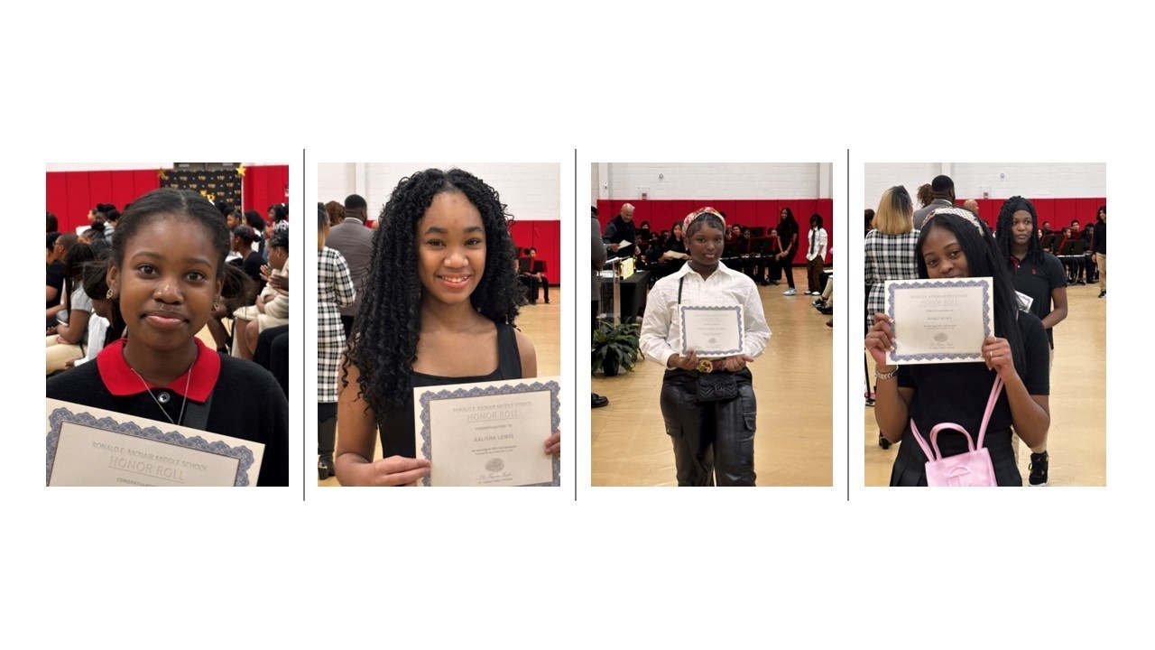 Students holding their honor&#39;s day certificates