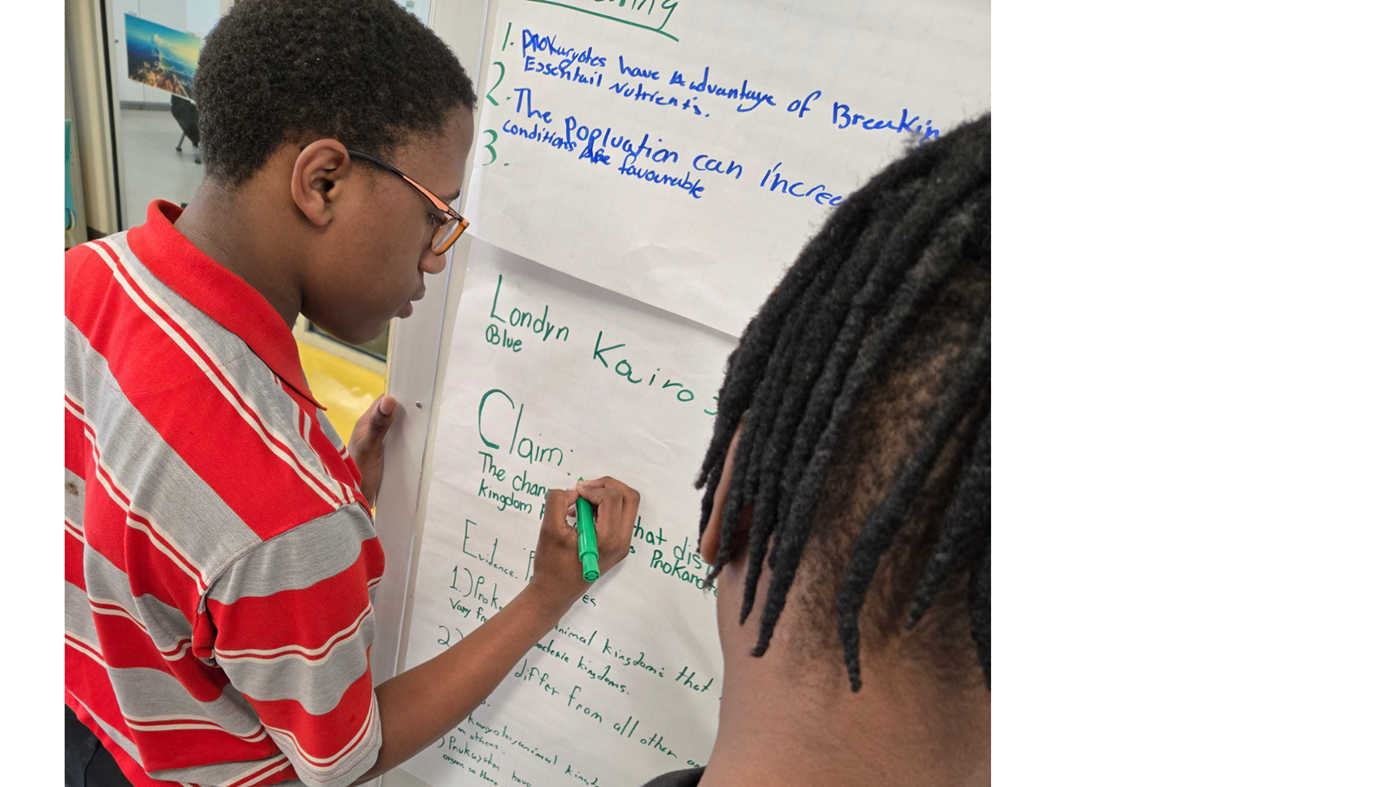 male students completing a CER project